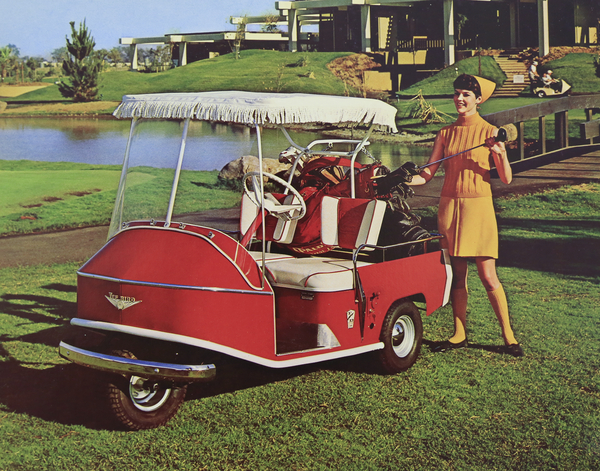 historic image of woman pulling a golf club from a golf utility vehicle