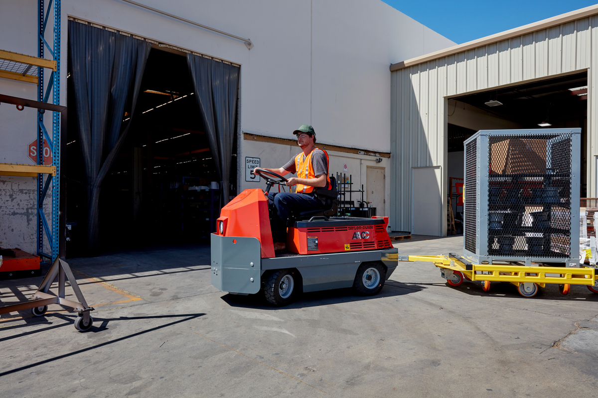 Taylor-Dunn Huskey C-426 Tow Tractor Towing outdoor industrial manufacturing warehouse facility